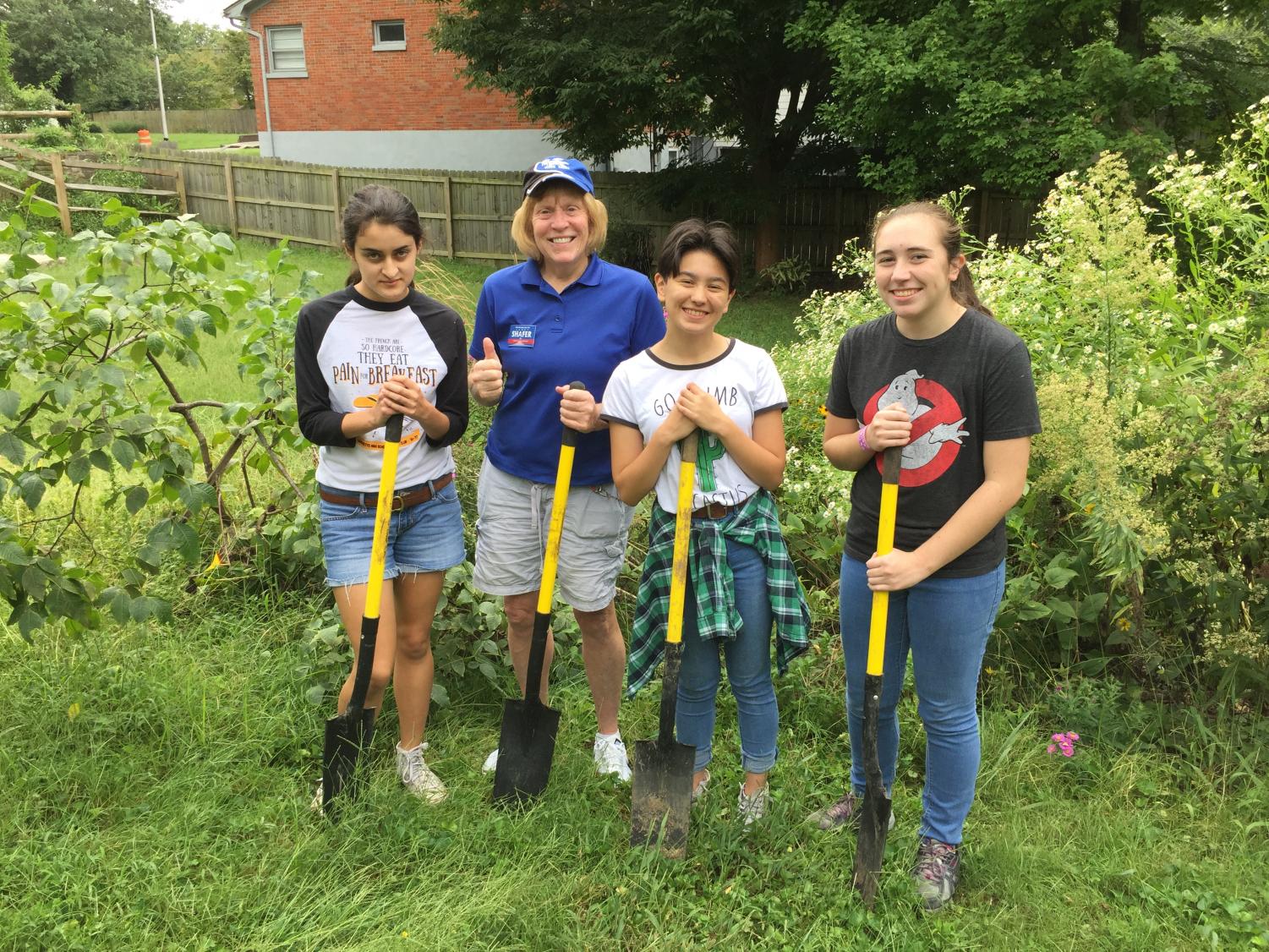 Bridget Bender, Sandy Shafer, Maya Mintu, Anne Elizabeth work on the Lone Oak Community Garden.