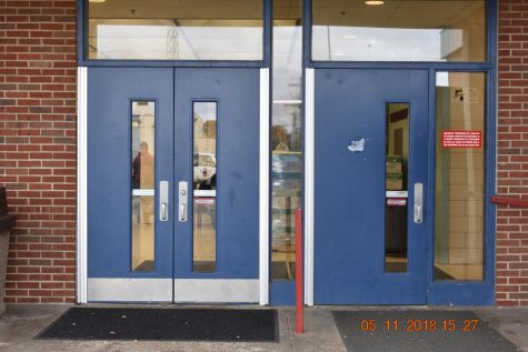 The bus foyer doors and a possible location for metal detectors.