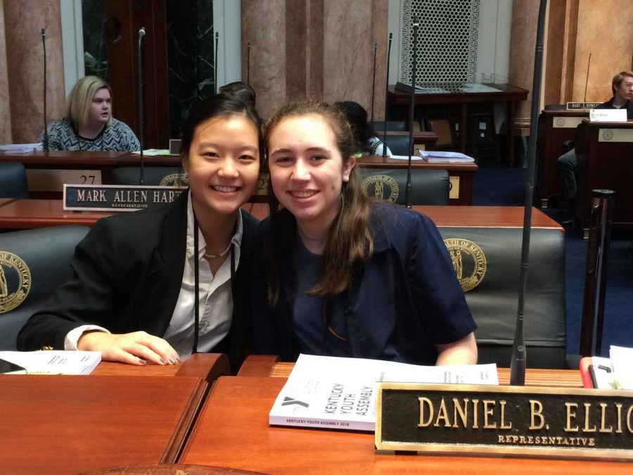 Sharlene Wang and Anne Elizabeth Forker prepare for debate in the Kentucky House at the Capitol. 