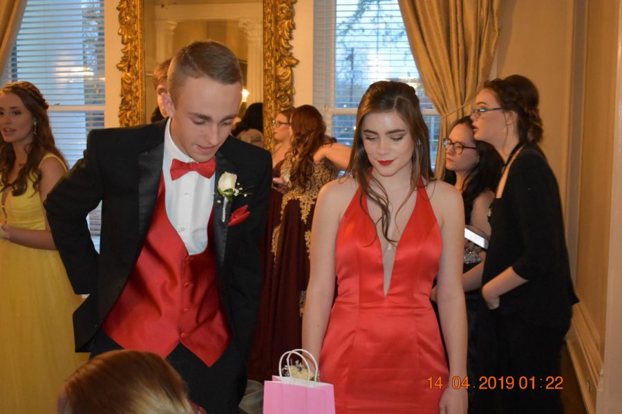 Shannon James and Sayre Compton check in to prom