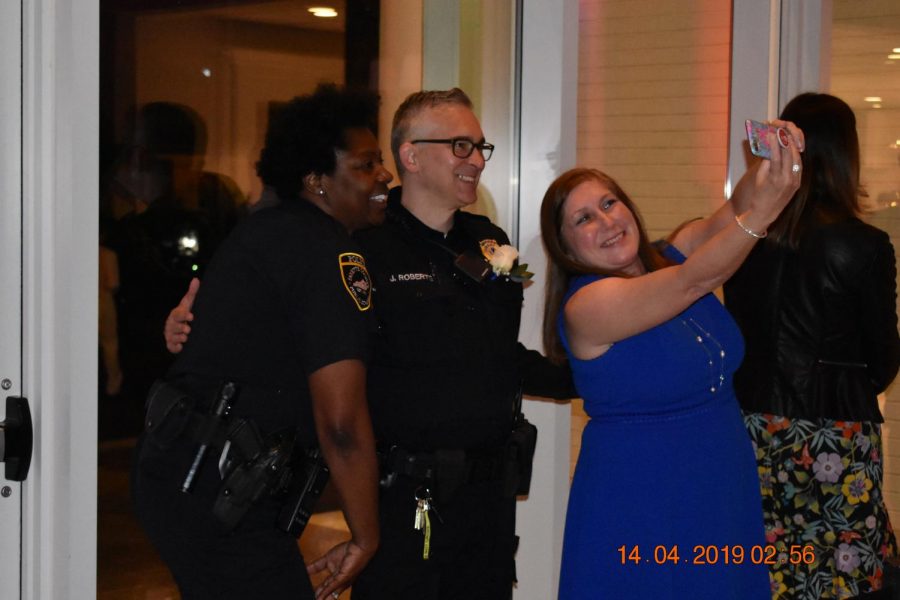 Ms. Hardin caught taking a selfie with Officers Scott and Roberts.