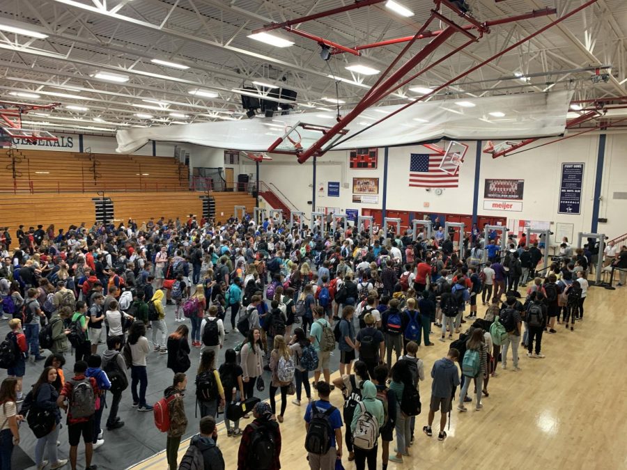 A panorama of the gymnasium during the peak of the morning rush, minutes before bag searches were stopped.