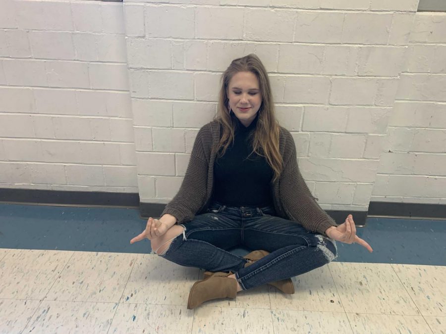 Student Emily Wrede participating in the mindful minute.