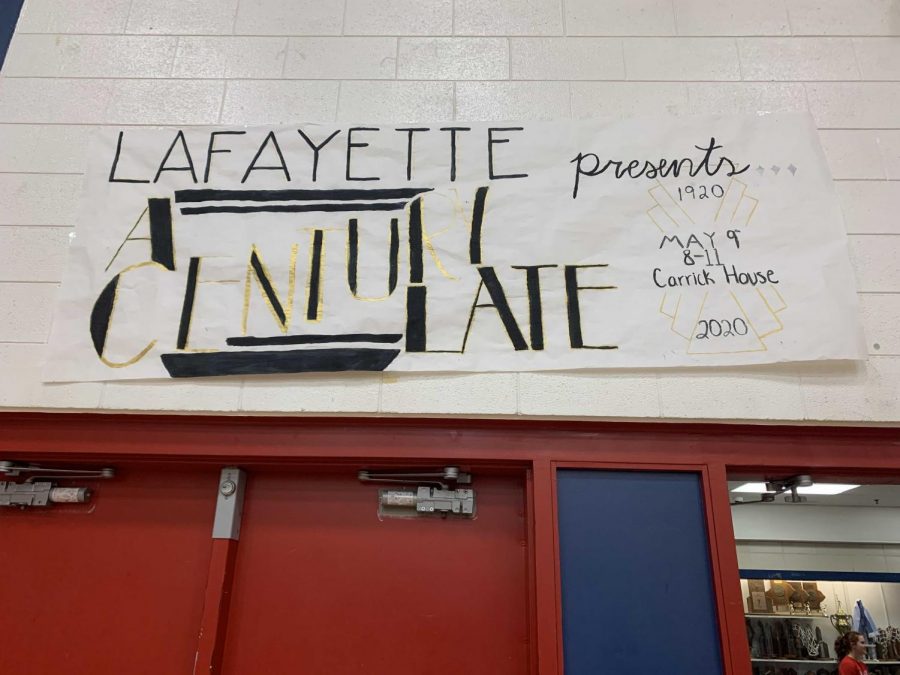 A poster hanging in the gym announces the 2020 Prom theme: the Roaring 20s--A Century Late.