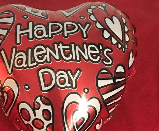 For Valentine's Day, many people buy balloons such as these, chocolates, and other gifts to celebrate Valentine's Day and show appreciation for their partner.