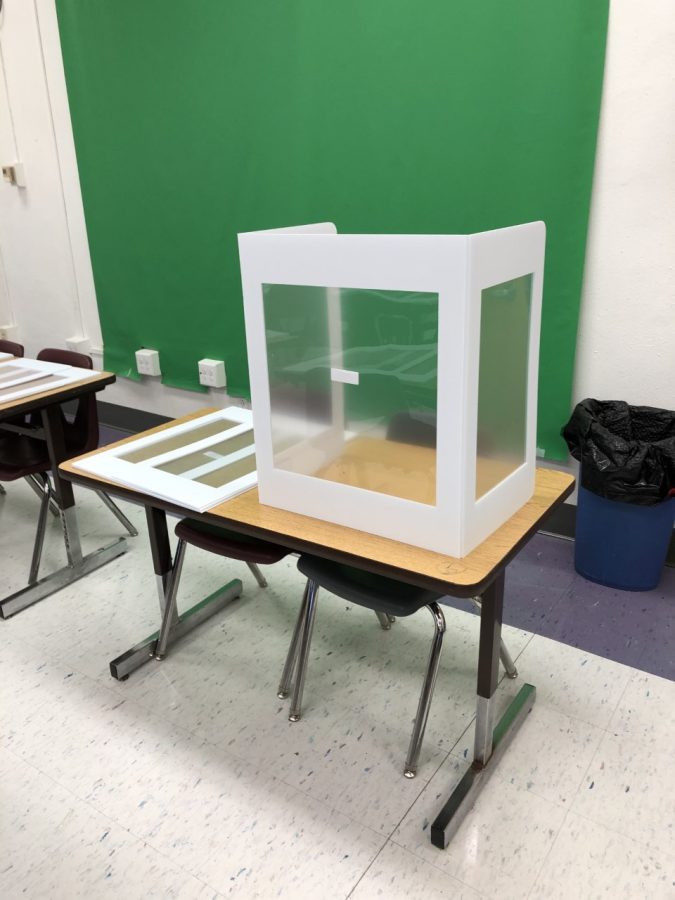 Lexington, KY. Plastic dividers like the ones pictured will be used in Lafayette classrooms that have tables.