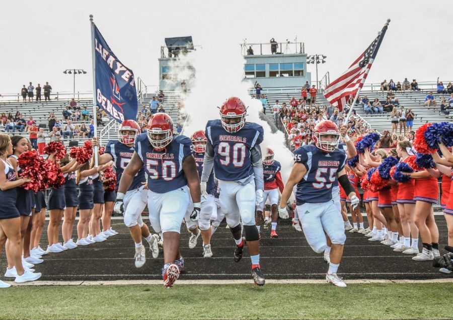 [LEXINGTON, KY] Dylan Womack (50), Donovan Jackson (90), and Ruben Garcia (55) are pictured as the Lafayette Generals take the field.