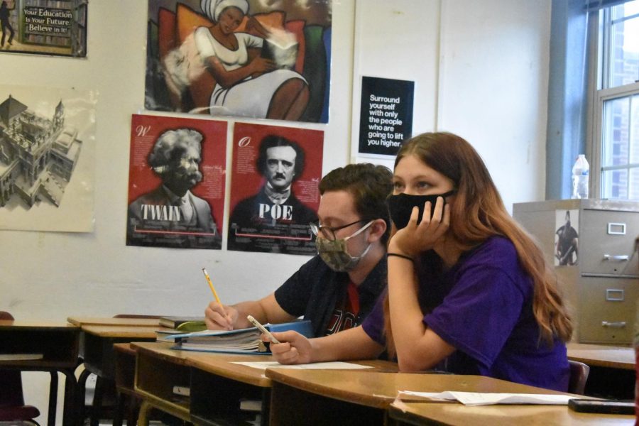 Logan Ward (Junior Debate captain) and Skylar Seavey (Junior Speech captain) auditioning a student for the 2021-2022 Speech and Debate team.