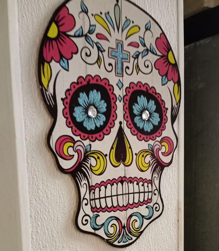 A sugar skull used as decoration at a local taco bell