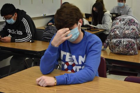 Lafayette junior Josh Smith listening to the new The Weeknd album, Dawn FM and agonizing over the mediocre songs.