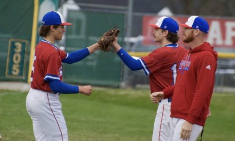 [LEXINGTON, KY] After a successful defensive inning, Carter Owens (left) celebrates with teammates.