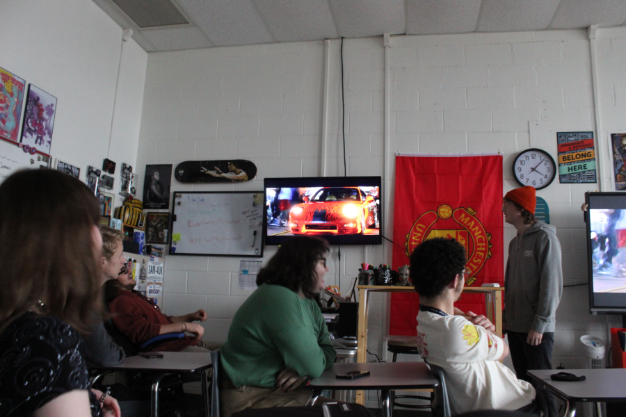 Senior officer Clay Gregory presents his slideshow on car chases in film to the Film Club on December 6th.