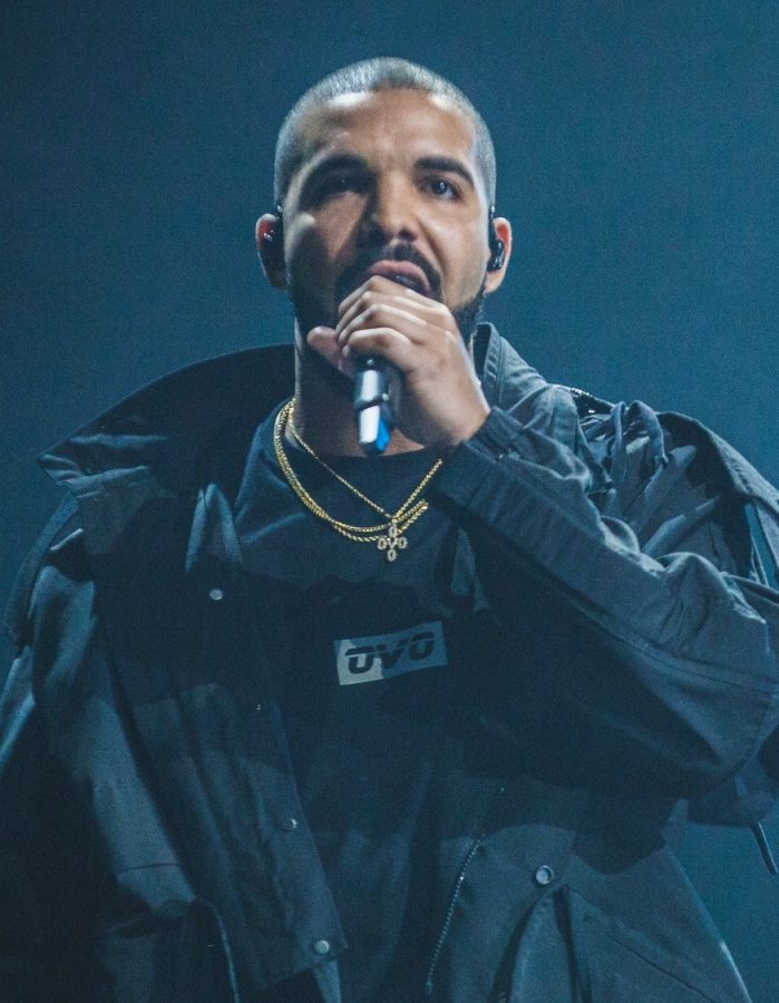 Drake performing at a crowded stadium, 2016.