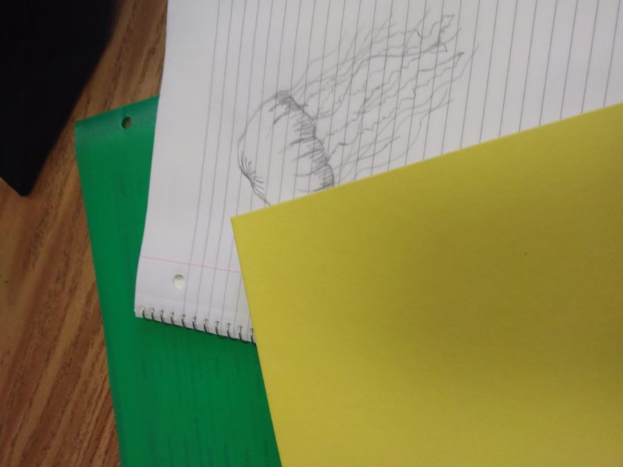 Lexington, KY. A drawing of a jellyfish hidden in a students things.