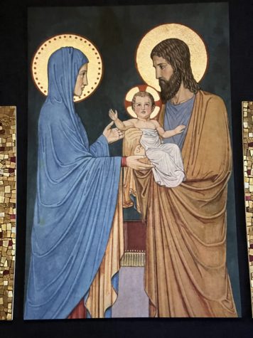 A mural of the Holy Family- Jesus, Mary, and Joseph- hung outside the Guadalupe Chapel in the Cathedral of Christ the King in Lexington, KY.