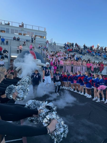 Players on the Lafayette Football Team, Phillip Newell(74), Kenneth Walker(77), and Riley(16) make there way onto the field for the Lafayette football game on October 18, 2024 at 6:24 P.M.