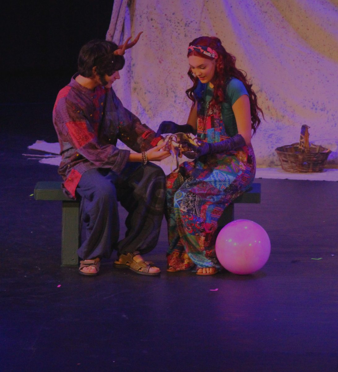 The main character and her dad onstage in the Lily Plants A Garden Fall Show at Lafayette High School on September 20th, 2024.