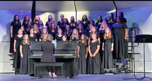 Lafayette Adv.Treble Choir, led by Laura Howard, singing in the Beeler auditorium at the 2024 fall Informance, October 10, 2024.