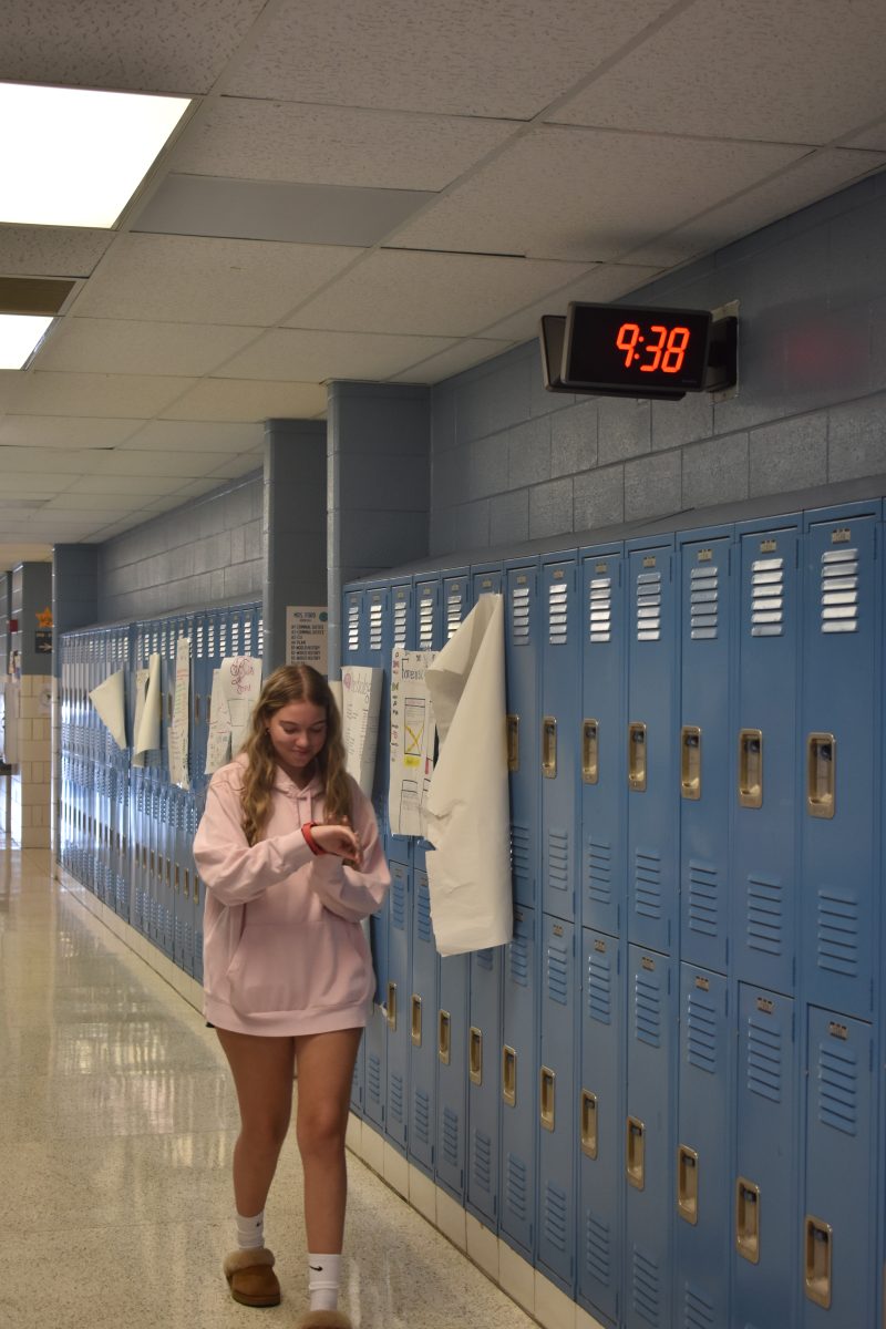 On September 18th, 2024 at 9:44  Sophie Mendenhall was walking through history hallway, looking at her watch instead of the clocks on the wall because of the broken inaccurate clocks.