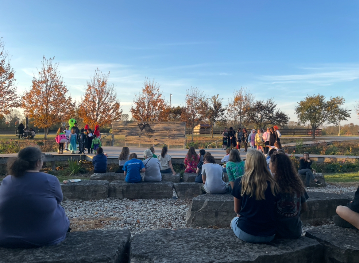 Elementary, Middle, and High school children separate on the stage by their level of school at the Locust Trace Fall Festival and Cookout on October 29th, 2024 at 6:06 P.M., so they they can be judged for the costume contest.