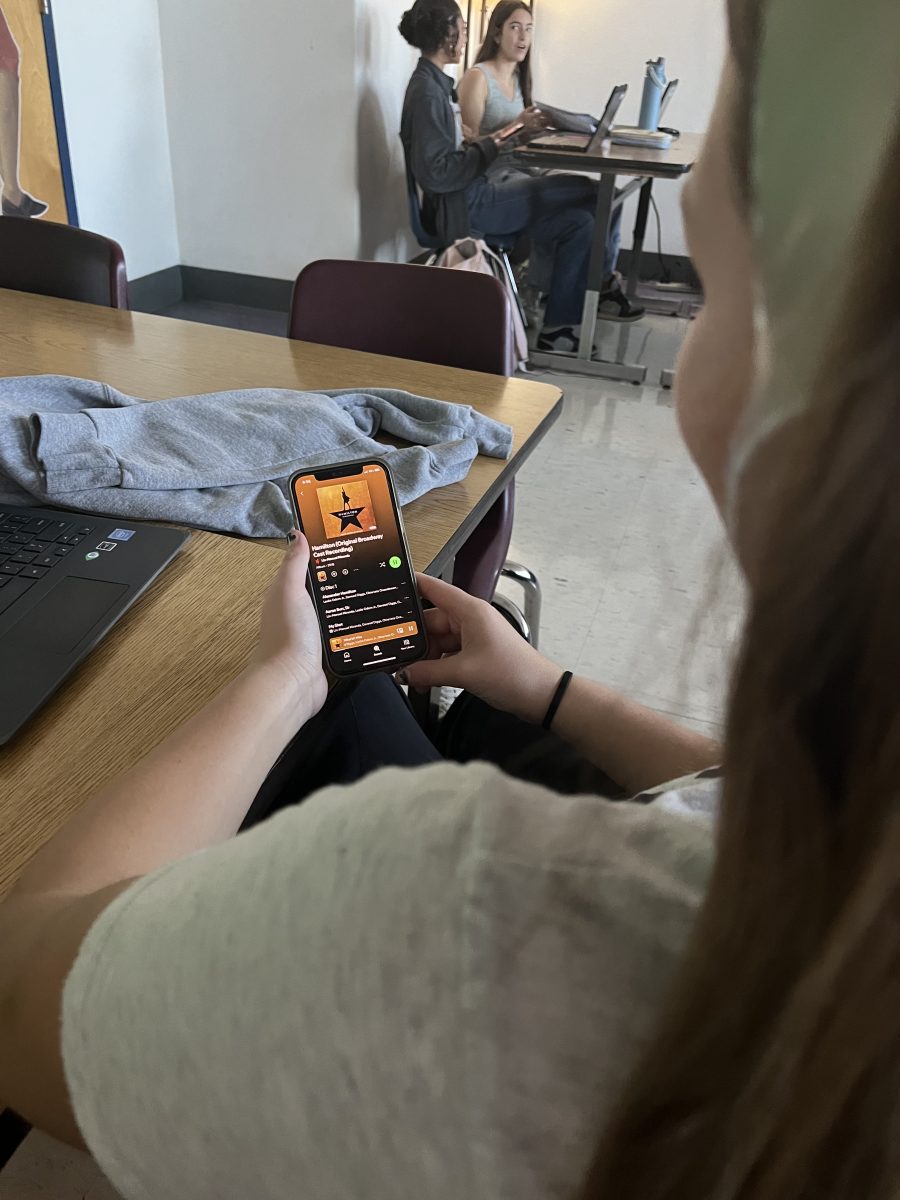 Ashlynn Jones listening to "What'd I Miss" off the Hamilton soundtrack. Taken in Journalism class 11/11/24.