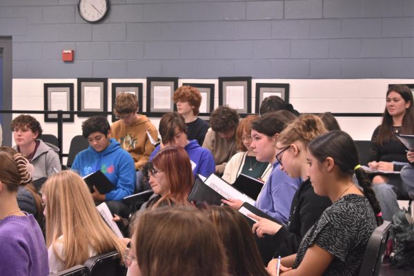 Lafayette Choir practicing for their winter concert with director Ryan Marsh on November 13, 2024, in the choir room in the music hallway. Photo taken by Isaac Critchfield