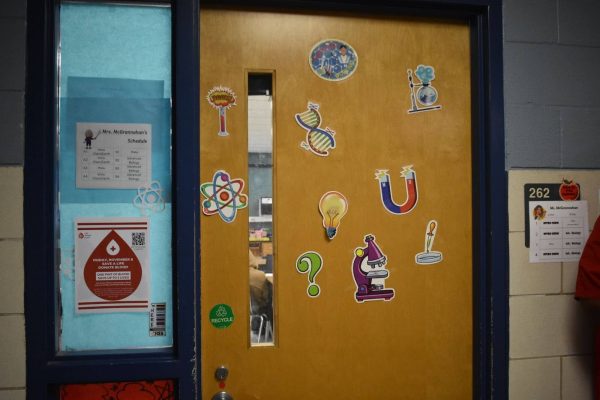 Mrs. McGrannahan's decided to decorate her door with fun stickers related to her teaching subject.