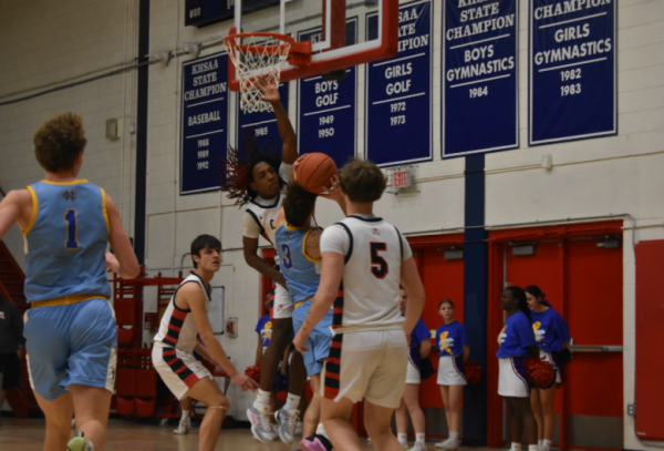 KJ Jones (#1) blocks player #3 from scoring. Taken on Friday, Feb. 21st, 2025.