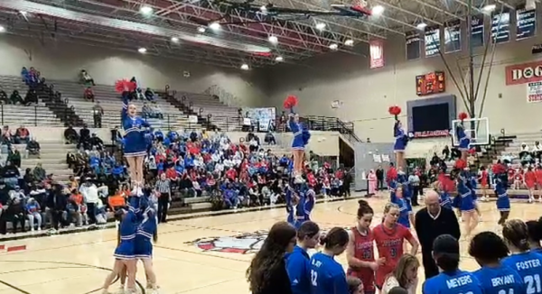 This is the cheerleading team doing a quarter performance at Paul Laurence Dunbar. This picture was taken on March 6th at 8:10.m.