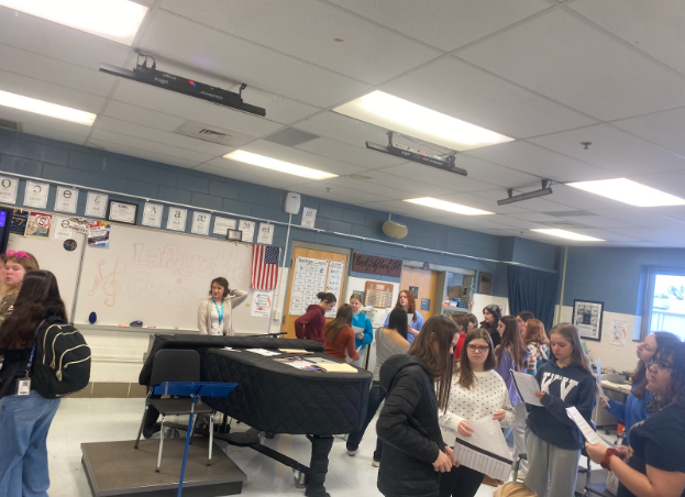 The Lafayette Advanced Treble choir practicing music in sectionals with their  director, Laura Howard during class rehearsal. Taken on Friday February 21st.