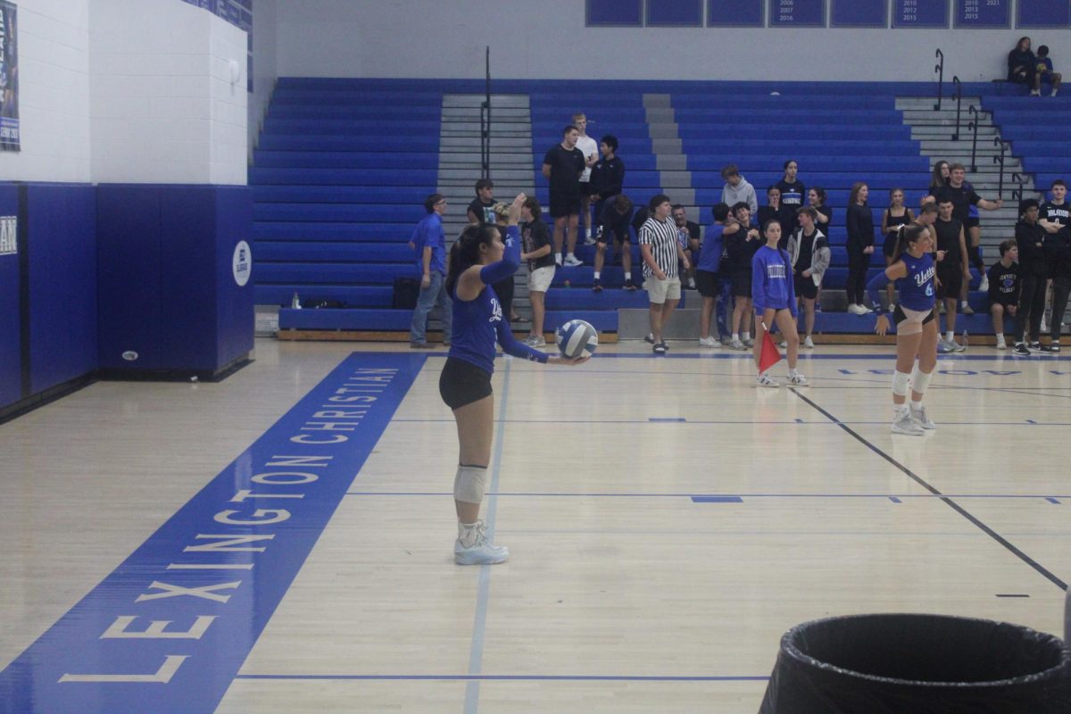 Varsity player Elise Tremble (#3) preparing to serve. Sept. 23, 2025.