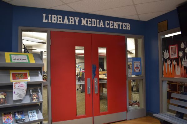 Outside of the Lafayette library on October 9, where students can drop off their donated books to support The International Book Project.