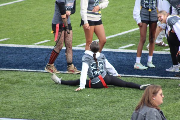 Maddie Means celebrating with a split on the field during the Lafayette High School Powderpuff game on Oct. 31, 2025.