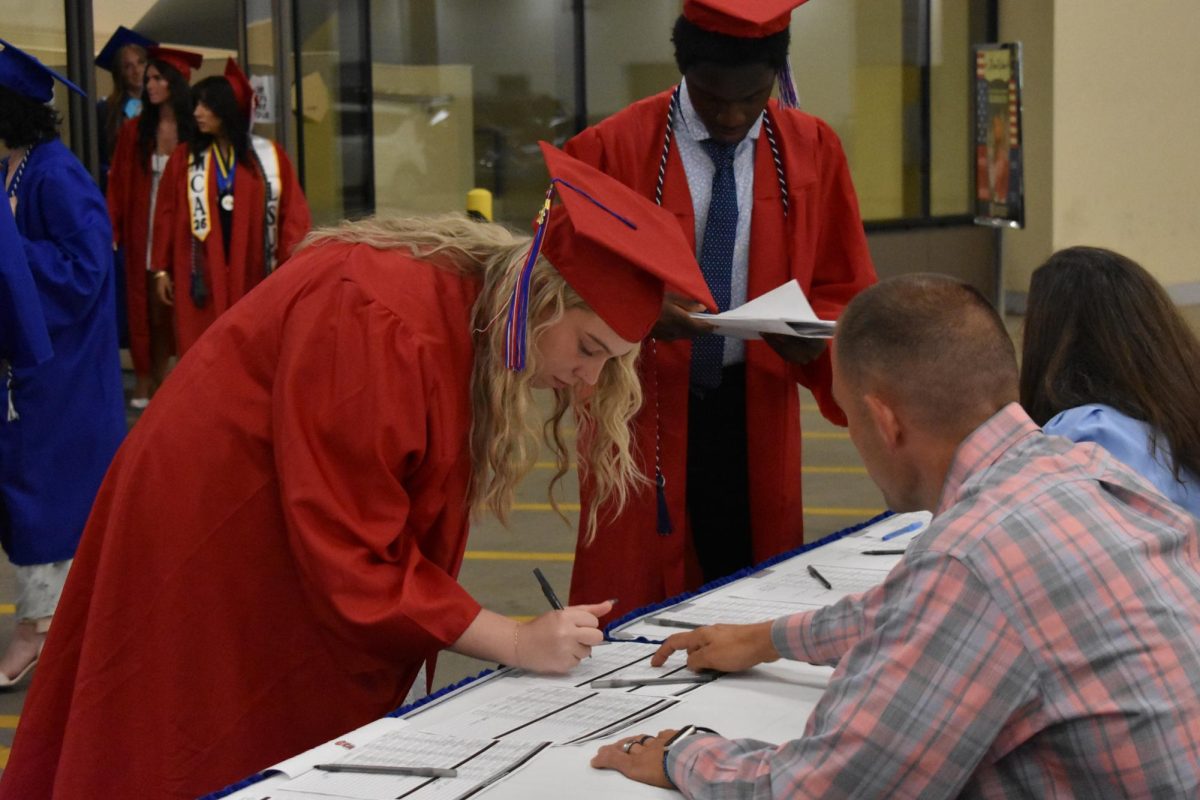 LEXINGTON, KY.  Students sign in before Lafayette's graduation ceremonies at Rupp Arena on June 4, 2026.