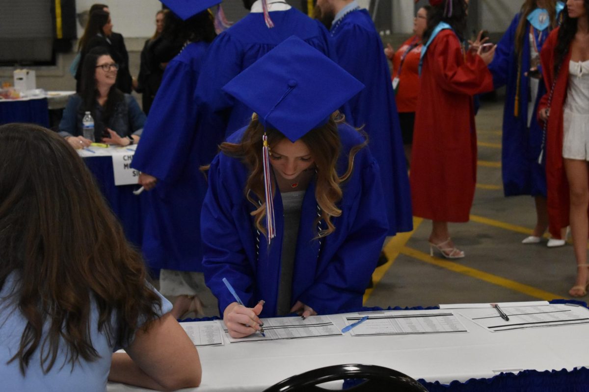 LEXINGTON, KY.  Students sign in before Lafayette's graduation ceremonies at Rupp Arena on June 4, 2026.