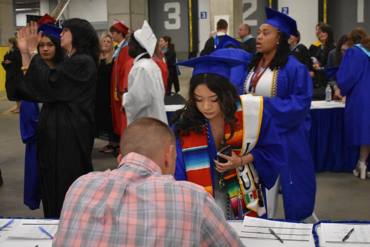 LEXINGTON, KY.  Students sign in before Lafayette's graduation ceremonies at Rupp Arena on June 4, 2026.