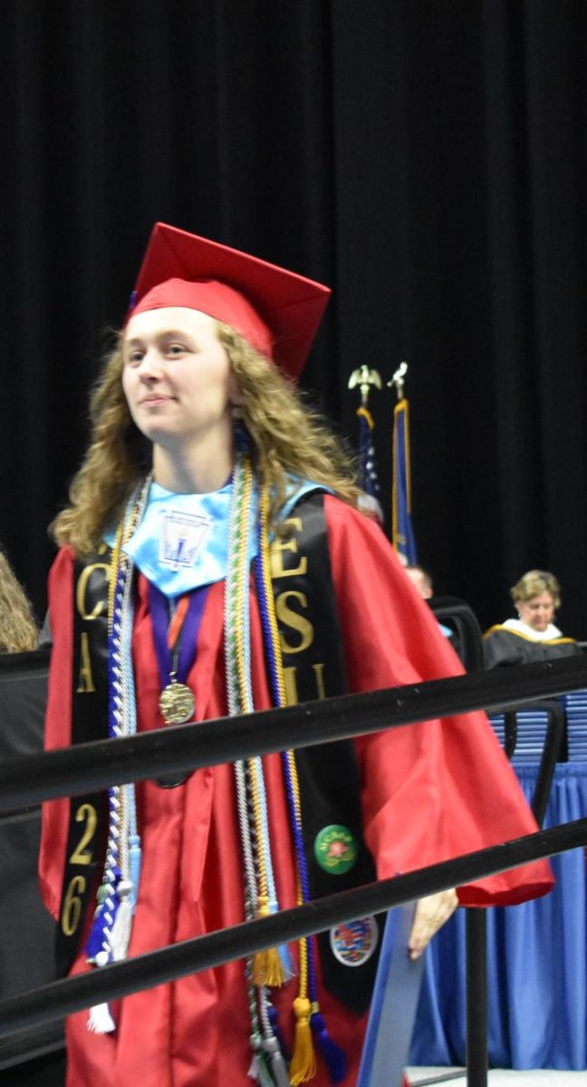LEXINGTON, KY.  A graduate exits the stage, with diploma, at Lafayette's graduation ceremonies at Rupp Arena on June 4, 2026.