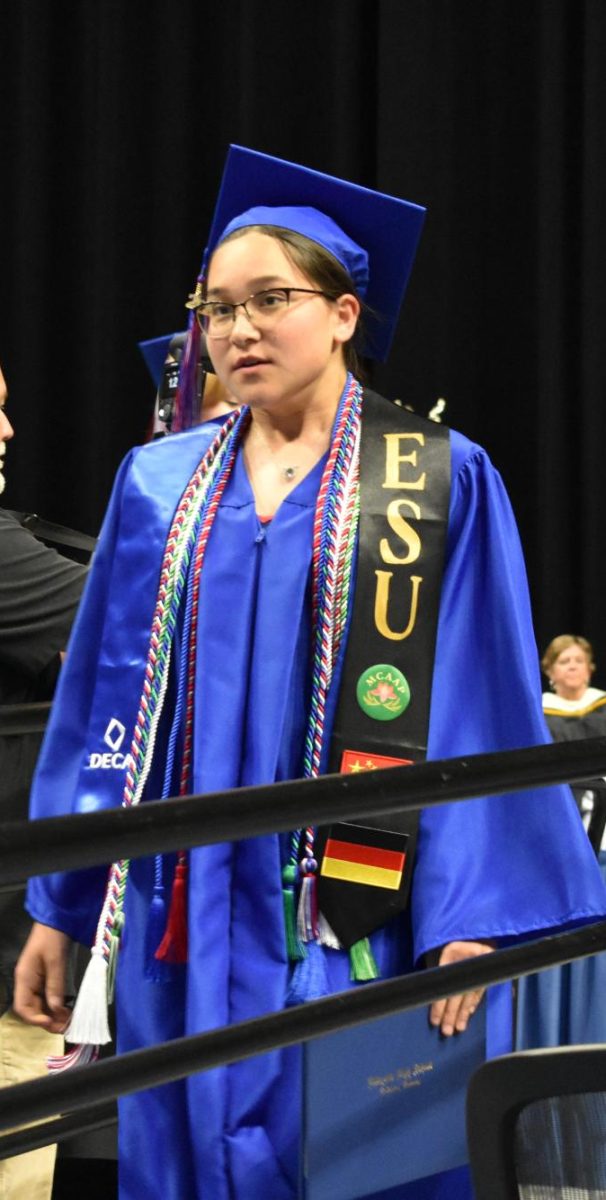 LEXINGTON, KY.  A graduate exits the stage with a diploma at Lafayette's graduation ceremonies at Rupp Arena on June 4, 2026.